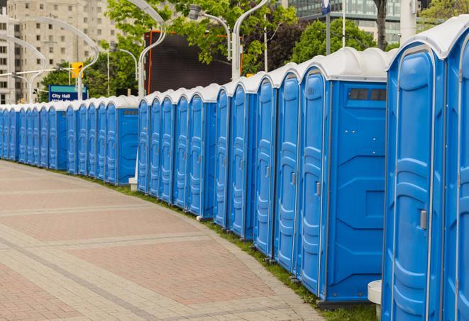 a row of portable restrooms at a fairground, offering visitors a clean and hassle-free experience in crosby